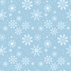 Winter seamless pattern with white snowflakes on a blue background