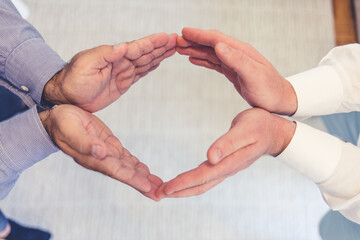 Teamwork, hands and circle in solidarity of two business persons in unity, collaboration and trust...