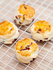 Cranberry scone set with raspberry jam and clotted cream
