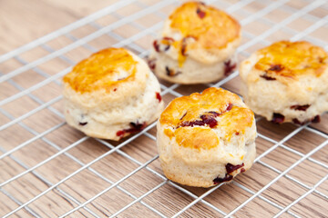 Cranberry scone set with raspberry jam and clotted cream