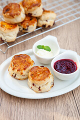 Cranberry scone set with raspberry jam and clotted cream