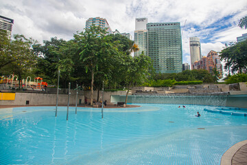 KLCC Park in the business center of Kuala Lumpur City, Malaysia. Public space is a place to rest as well as a tourist destination.