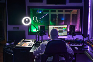 Music producer working in recording studio