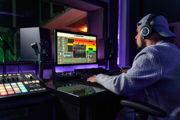 Music producer working in recording studio