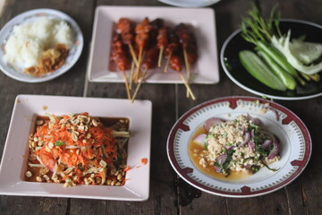 Papaya Salad, Larb, Sticky Rice with Grilled Chicken