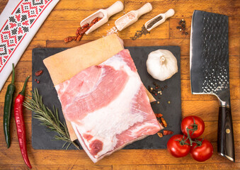 ordinary organized table to be served. Food tray with scrumptious portions of cold cuts, tomatoes...
