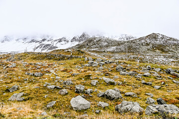 Flüela, Flüelapass, Alpen, Passhöhe, Passstrasse, Bergstrasse, Steinschlag, Felsen, Wintereinbruch, Wanderweg, Graubünden, Herbst, Herbstfarben, Schweiz