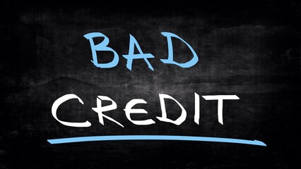 Fototapeta premium Bad credit concept handwritten on blackboard