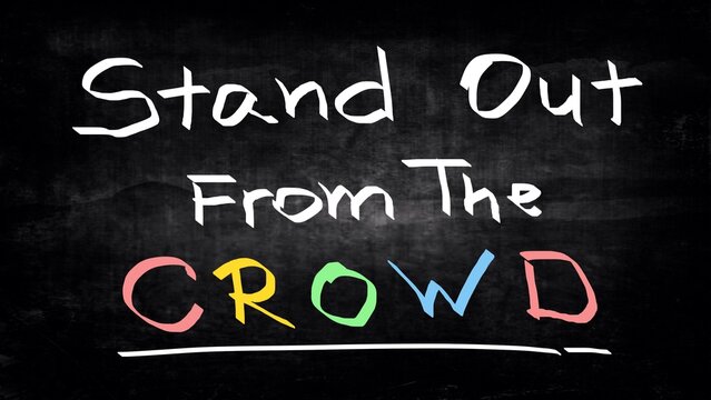 Stand out from the crowd handwritten on blackboard 