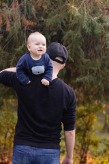 Fototapeta premium Happy father with his child outdoors.