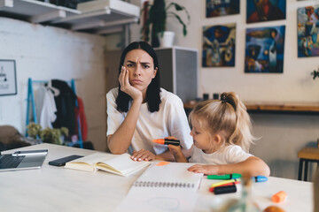 Displeased woman with naughty child