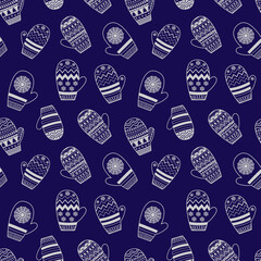 Seamless pattern. A set of winter mittens with colorful patterns on dark blue background. Merry Christmas and Happy new year 2023. Vector illustration