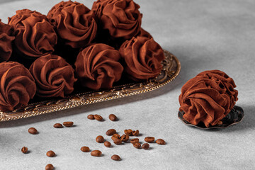 coffee marshmallows with a minimum amount of sugar on a gray background, healthy food. a delicacy for gourmets.