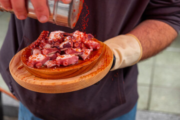 view of a delicious portion of octopus cooked in the Galician style, pulpo a feira © VicVaz