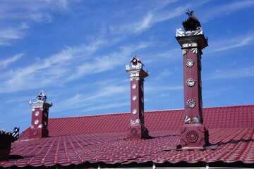 An interesting decorated chimney and roof on an infield house in the provincial town of Gorodets in Russia