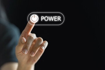 Finger press power button on virtual touch screen, modern technology concept.