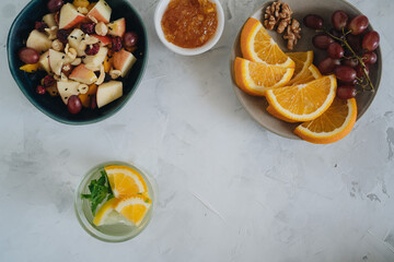 Plates with fruit on white background