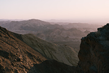 Fototapeta premium sunset over mountain valley in the desert
