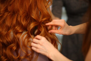 woman combing her hair