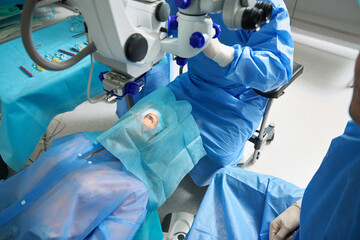 Surgeons preparing for eye operation in the hospital