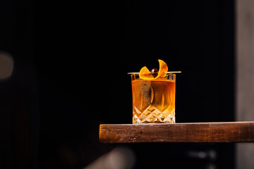 old fashioned cocktail classic bourbon whiskey and bitters, orange peel and cherry as garnish - obrazy, fototapety, plakaty