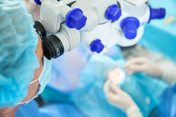 Obraz na płótnie Canvas Close up photo of doctor doing surgery