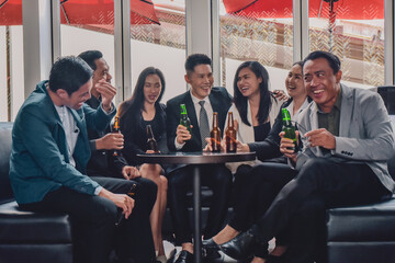 Asian people group drinking in party congratulation business team ,Group Of Friends Enjoying...