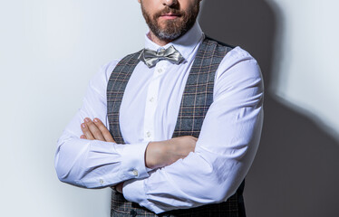 cropped view of guy in tuxedo on grey background. tuxedo guy in studio. photo of guy