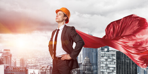 Concept of power and sucess with architect superhero in big city
