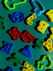 COLORFULL ALPHABETS FOR KIDS TO LEARN AT HOME MENTAL DEVELOPMENT OF CHILDREAN LEARNING AND HOBBY CONCEPT
