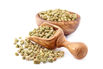 Thyme spice in wooden spoon isolated on white background. Oregano ball. Thymus vulgaris.