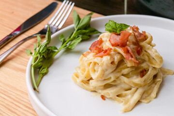 fettuccini with sauce, carbonara, pesto