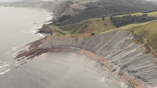 drone flysch sea stack rock lines formation beach stones 