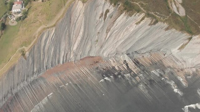 drone flysch sea stack rock lines formation beach stones 