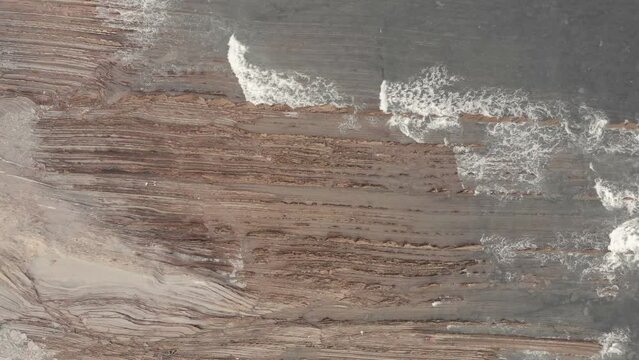 drone flysch sea stack rock lines formation beach stones 