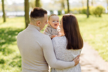 Fototapeta premium Family Enjoying Walk In Park