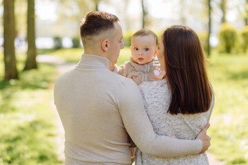 Fototapeta premium Family Enjoying Walk In Park