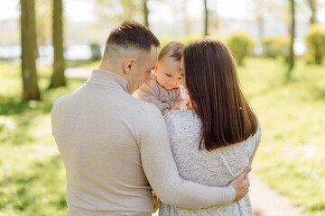 Fototapeta premium Family Enjoying Walk In Park