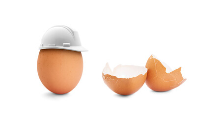 Egg with a construction helmet and broken egg
