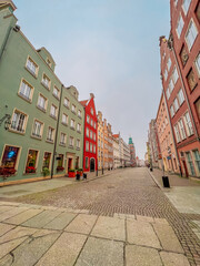Obraz premium Gdansk, Poland - October 30, 2022:Old City. Long Market street. People on the main market square of historic city Gdansk, Poland. Travel vacation concept.