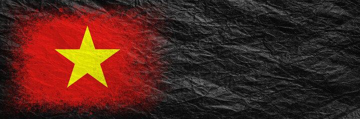 Flag of Vietnam. Flag is painted on black crumpled paper. Paper background. Copy space. Textured background