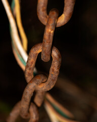 a close up of a rusty chain