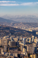 top view of the city of Tbilisi in Georgia and the mountains on the horizon