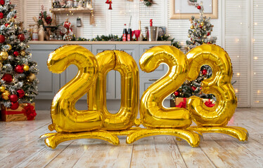 golden inflatable numbers 2023, new year concept.