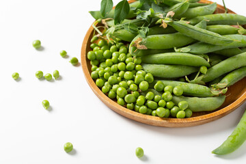 Close up of fresh sweet green peas pods and beans