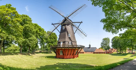 Fotobehang Windmill in the Kastellet fortress citadel in Copenhagen, Denmark on a sunny day © elroce