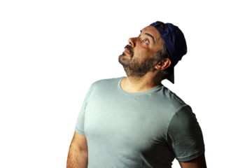 Man in a cap looking up. Transparent background