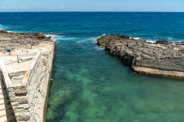 Marina Serra coast Lecce Italy  The defensive tower and stone swimming pool of Marina Serra.