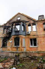 destroyed and burned houses in the city during the war in Ukraine