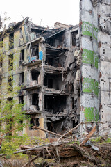 destroyed and burned houses in the city during the war in Ukraine